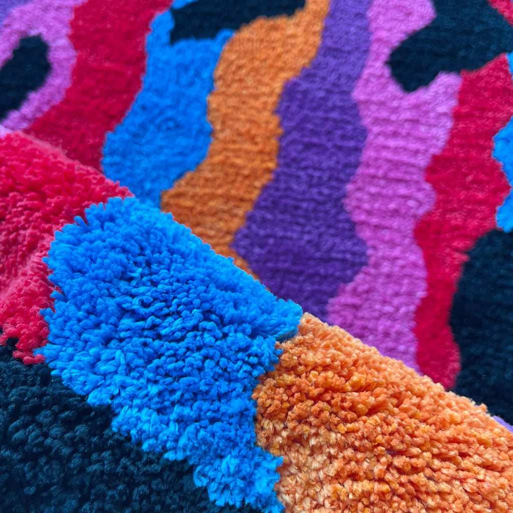 Cassora plush wavy smiley face rug