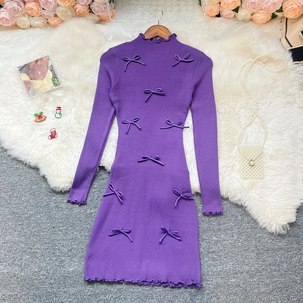 Sorelle Women's knitted ruffle hem dress with bow accents