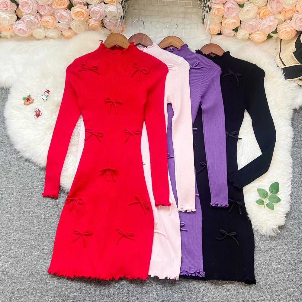 Sorelle Women's knitted ruffle hem dress with bow accents