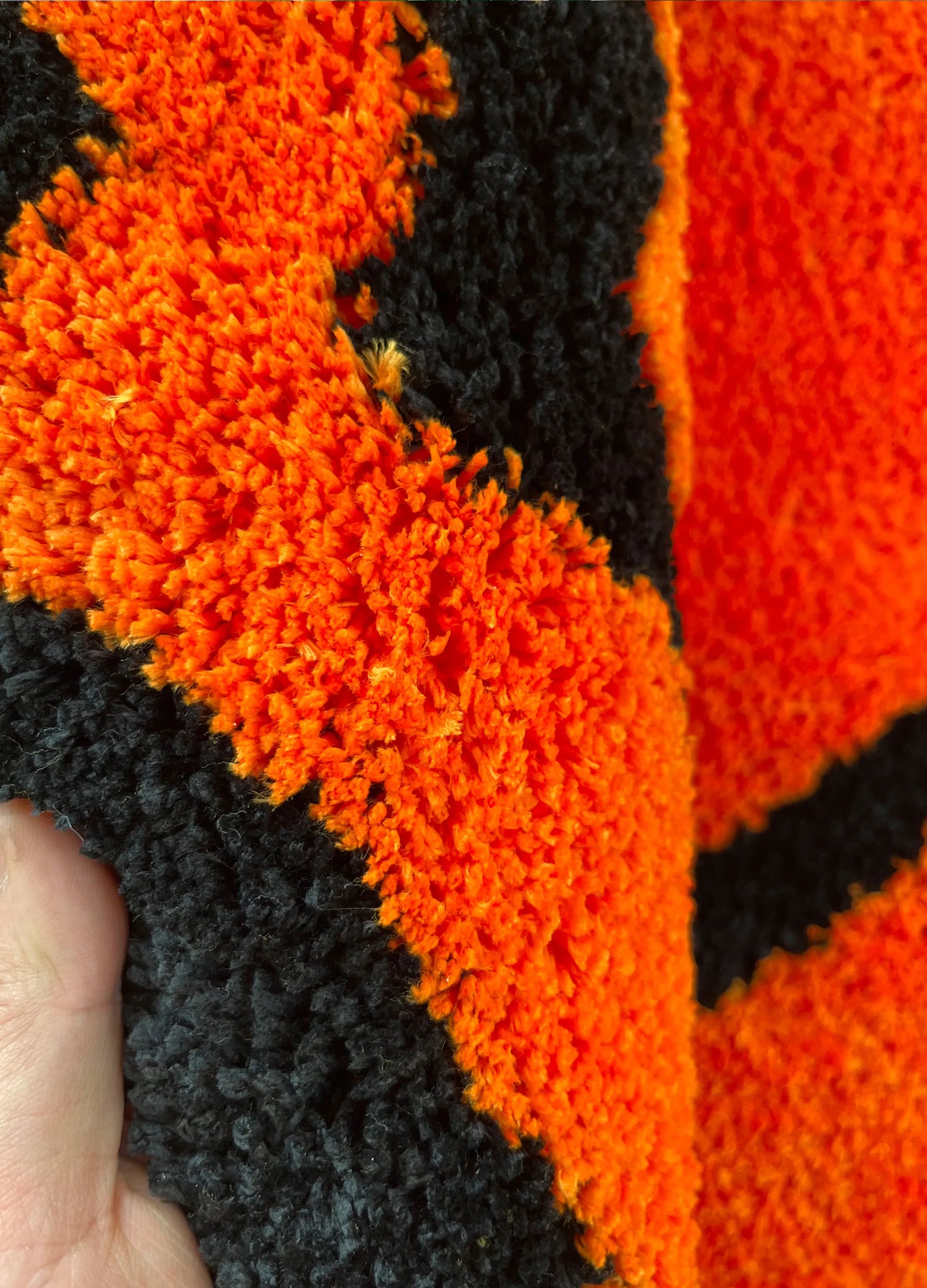 Cassora plush wavy smiley face rug