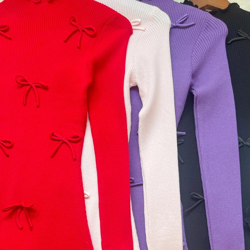 Sorelle Women's knitted ruffle hem dress with bow accents