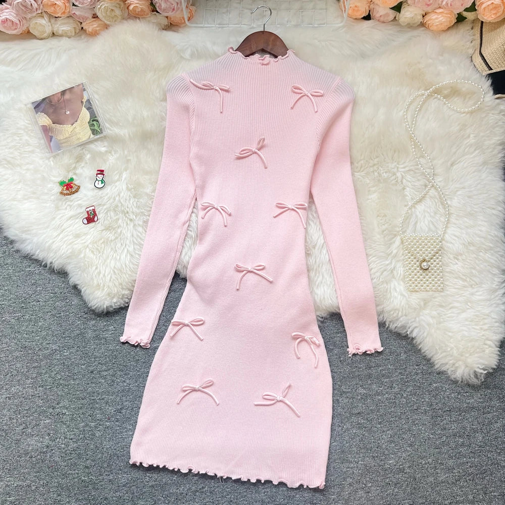 Sorelle Women's knitted ruffle hem dress with bow accents