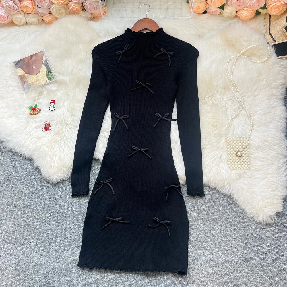 Sorelle Women's knitted ruffle hem dress with bow accents