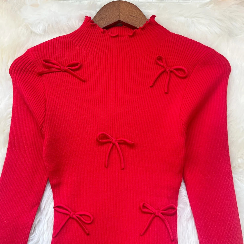 Sorelle Women's knitted ruffle hem dress with bow accents