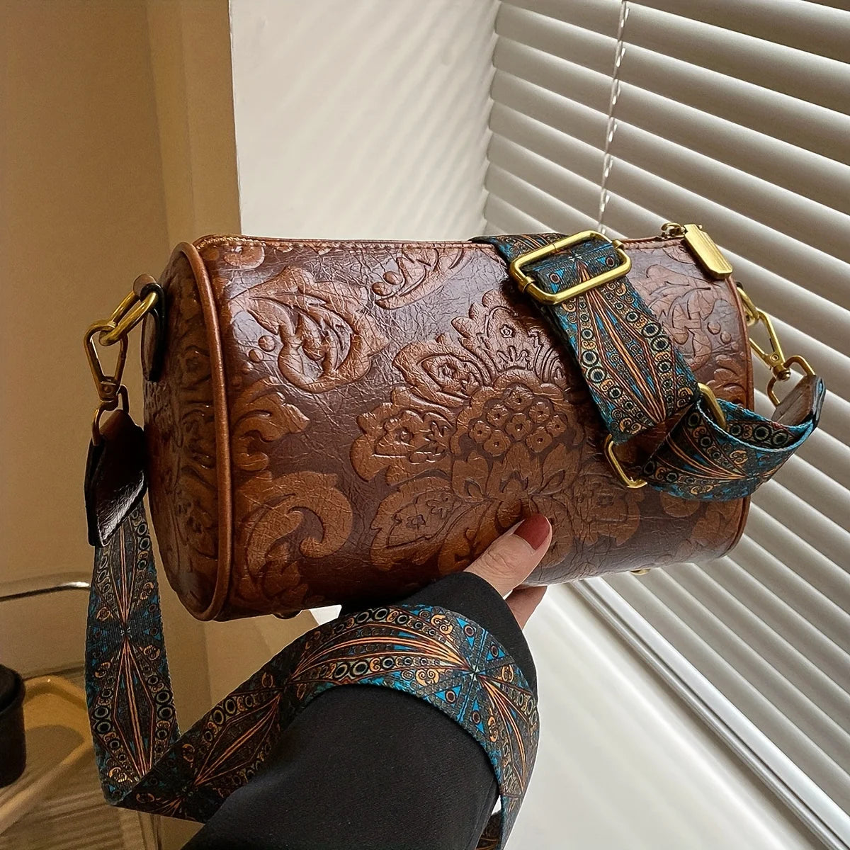 Kora retro flower embossed cylinder bag