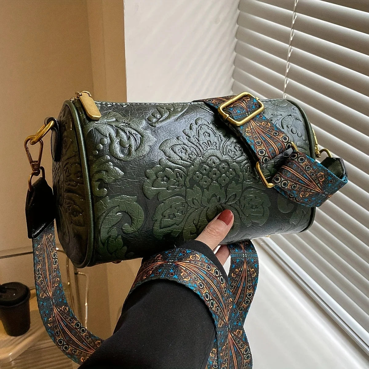 Kora retro flower embossed cylinder bag