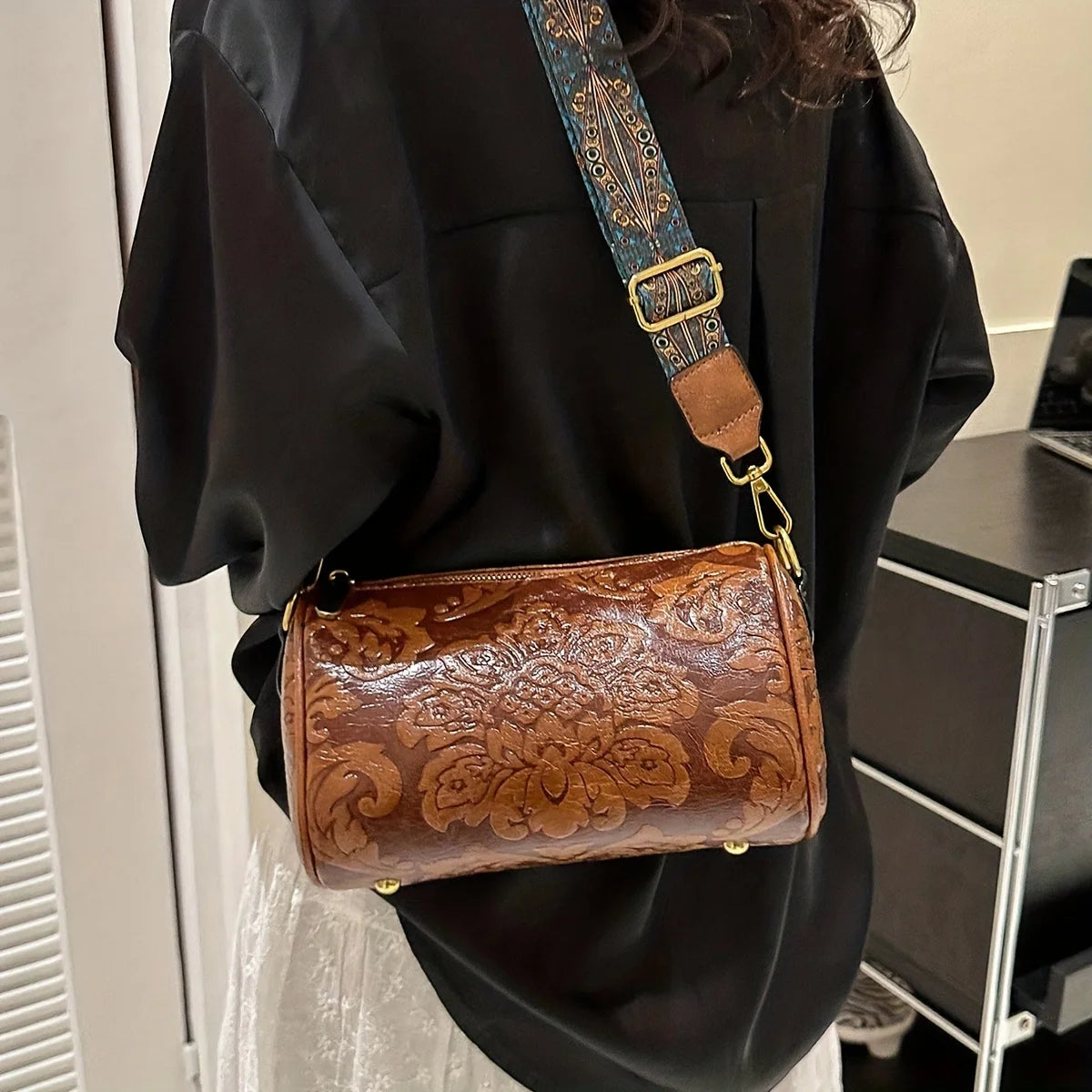 Kora retro flower embossed cylinder bag