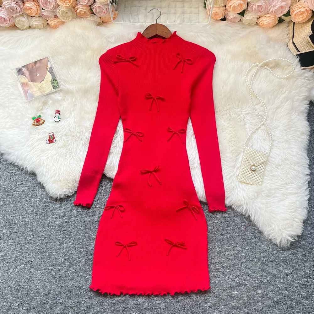 Sorelle Women's knitted ruffle hem dress with bow accents