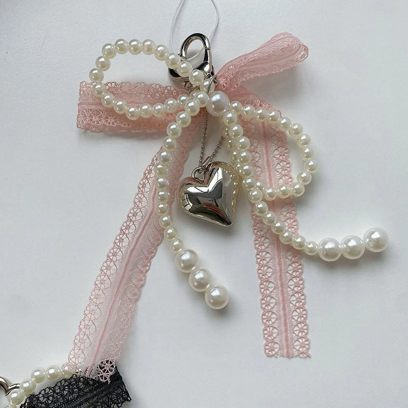 Noelie coquette ribbon x pearl bag charm