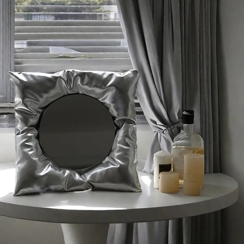 Cassora chrome pillow mirror