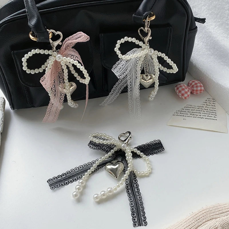 Noelie coquette ribbon x pearl bag charm
